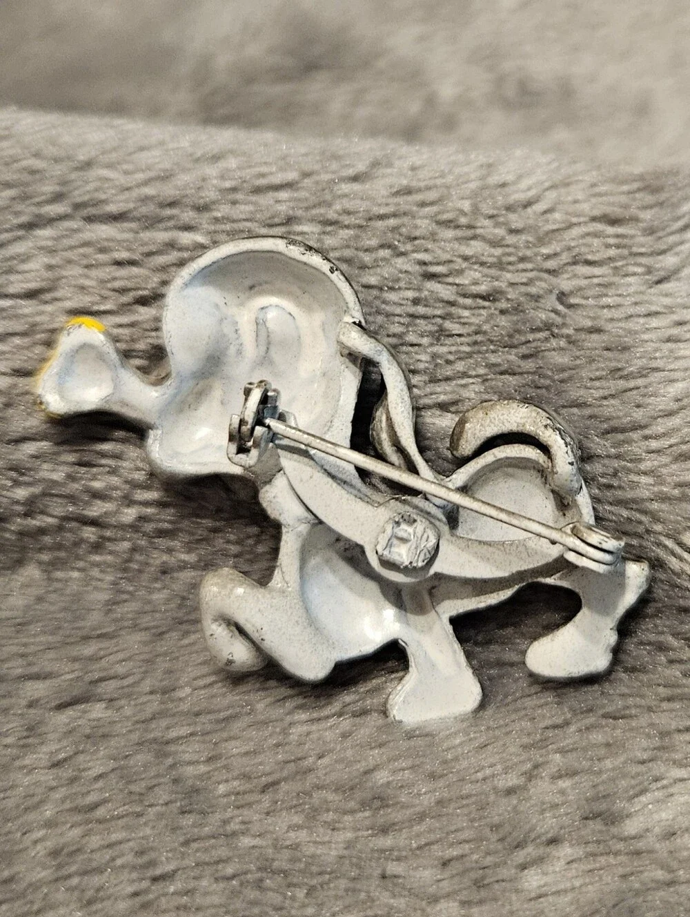 Vintage enamel brooch/pin - gray puppy holding a yellow bone.